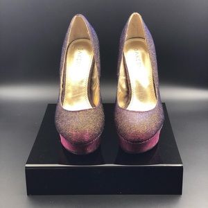 Iridescent pumps with golden overlay.